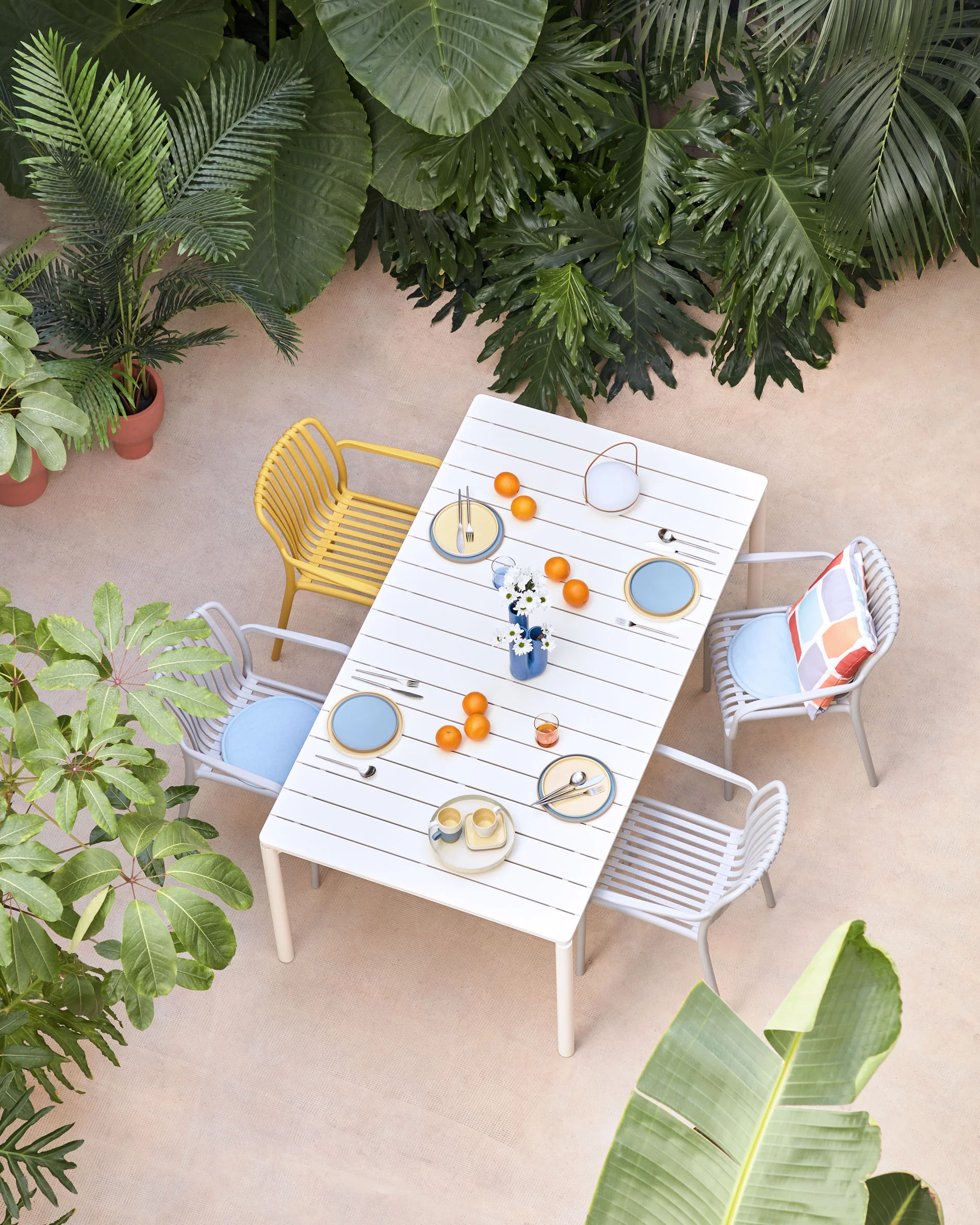 Isabellini stackable outdoor chair in yellow - Image 4