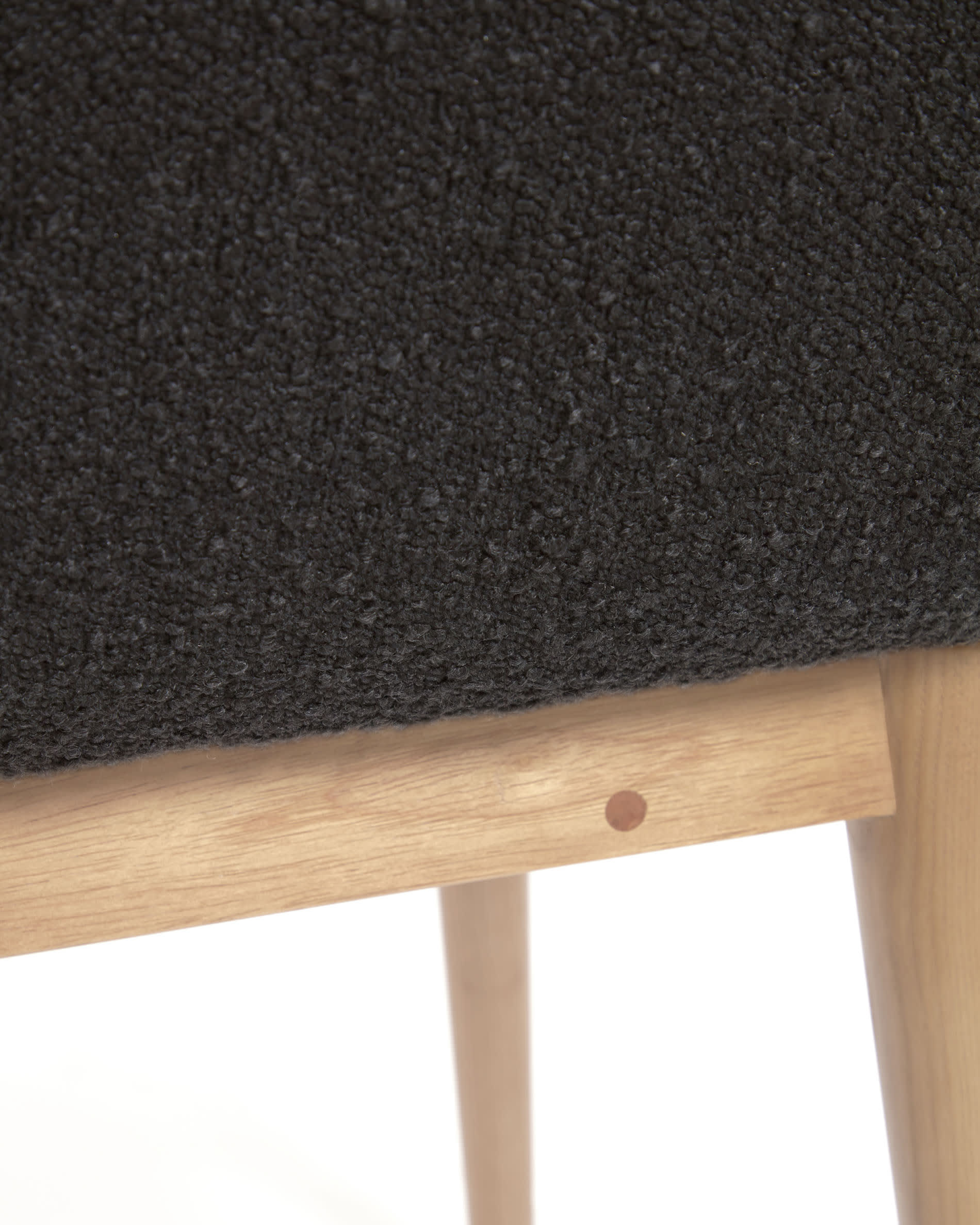 Konna chair in black bouclé with solid ash wood legs in a natural finish - Image 5